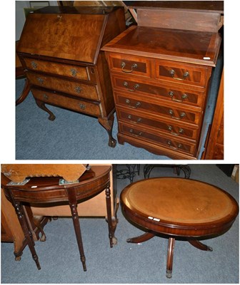 Lot 1089 - Revolving coffee table with drawer, a reproduction bureau, narrow chest of drawers and a D-end...