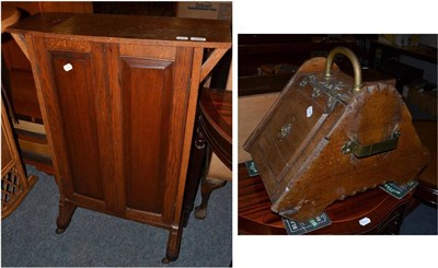 Lot 1090 - An Arts & Crafts oak book shelf and a coal scuttle