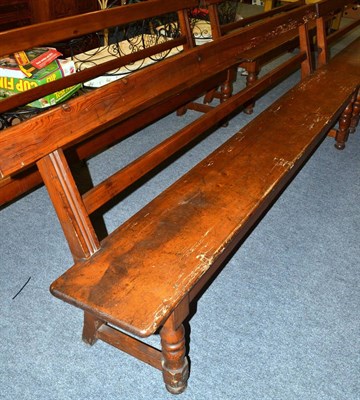 Lot 1104 - A pine bench/pew