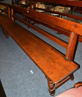 Lot 1105 - A pine bench/pew