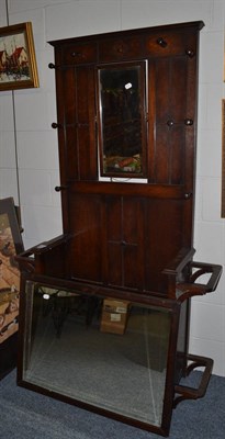 Lot 1111 - An oak hall chair/coat stand, a mirror, two pairs of yokes and a collection of sporting books