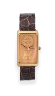 Lot 118 - An 18ct Gold Ingot Wristwatch, signed Corum, ref: 14400, circa 1985, lever movement, ingot gold...