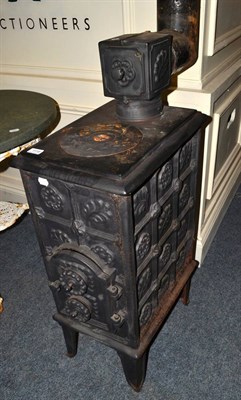 Lot 1119 - A cast iron stove