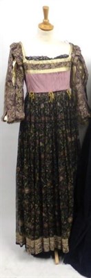 Lot 1198 - Two Tudor style theatrical dresses comprising velvet mounted full length dresses with tabs to...