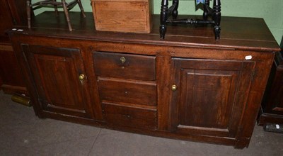 Lot 1301 - An 18th century and later oak dresser base