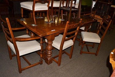 Lot 1325 - A reproduction oak refectory table and the matching set of six chairs (4+2)