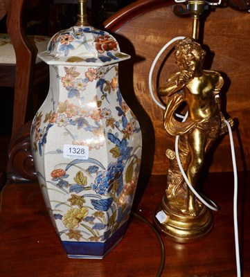 Lot 1328 - Cherub lamp and a pottery vase/lamp with shades