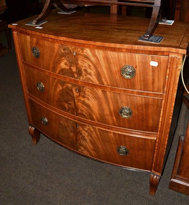 Lot 1329 - A bow fronted mahogany chest of drawers