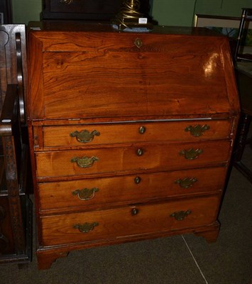 Lot 1348 - George III oak bureau