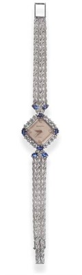 Lot 139 - A Lady's 18ct White Gold Diamond and Sapphire Set Wristwatch, signed Bueche Girod, circa 1975,...