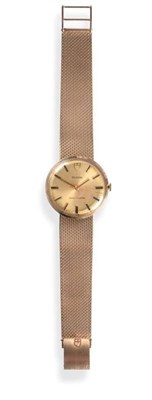 Lot 141 - A 9ct Gold Centre Seconds Wristwatch, signed Tudor, Shock-Resisting, 1973, lever movement...