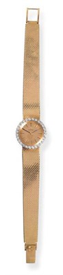 Lot 142 - A Lady's 18ct Gold Diamond Set Wristwatch, signed Omega, 1965, (calibre 620) 17-jewel lever...