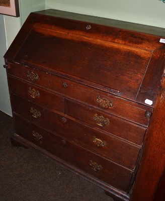 Lot 1399 - George III oak bureau