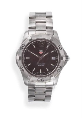 Lot 145 - A Stainless Steel Calendar Centre Seconds Wristwatch, signed Tag Heuer, model: Aquaracer, 300...