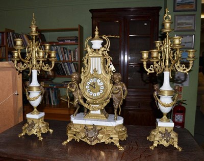 Lot 1411 - A modern striking clock garniture