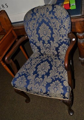 Lot 1414 - A pair of brocade upholstered armchairs on cabriole legs on pad feet