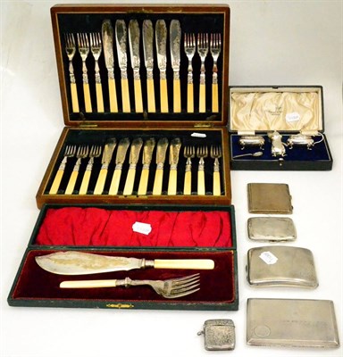 Lot 24 - A silver vesta, four cigarette cases, a plated cruet set, a set of fish servers and a cased set...