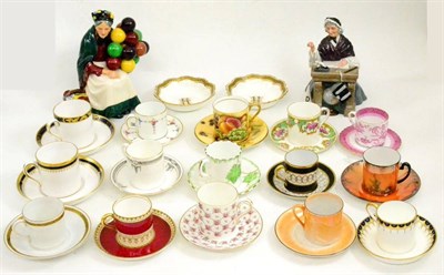 Lot 29 - Two Doulton figures ";Schoolmarm"; and ";Balloon Seller"; and fifteen coffee cans and saucers