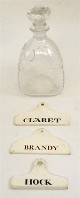 Lot 31 - Royal Commemorative decanter and three pottery wine cellar labels