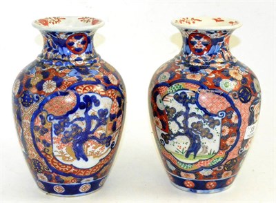 Lot 33 - A near pair of Chinese 19th century Imari pattern vases