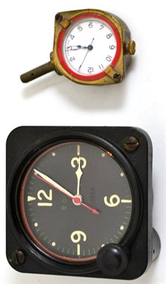 Lot 92 - Two military aviator's timepieces, 8-day military aircraft cockpit timepiece, reverse metal...