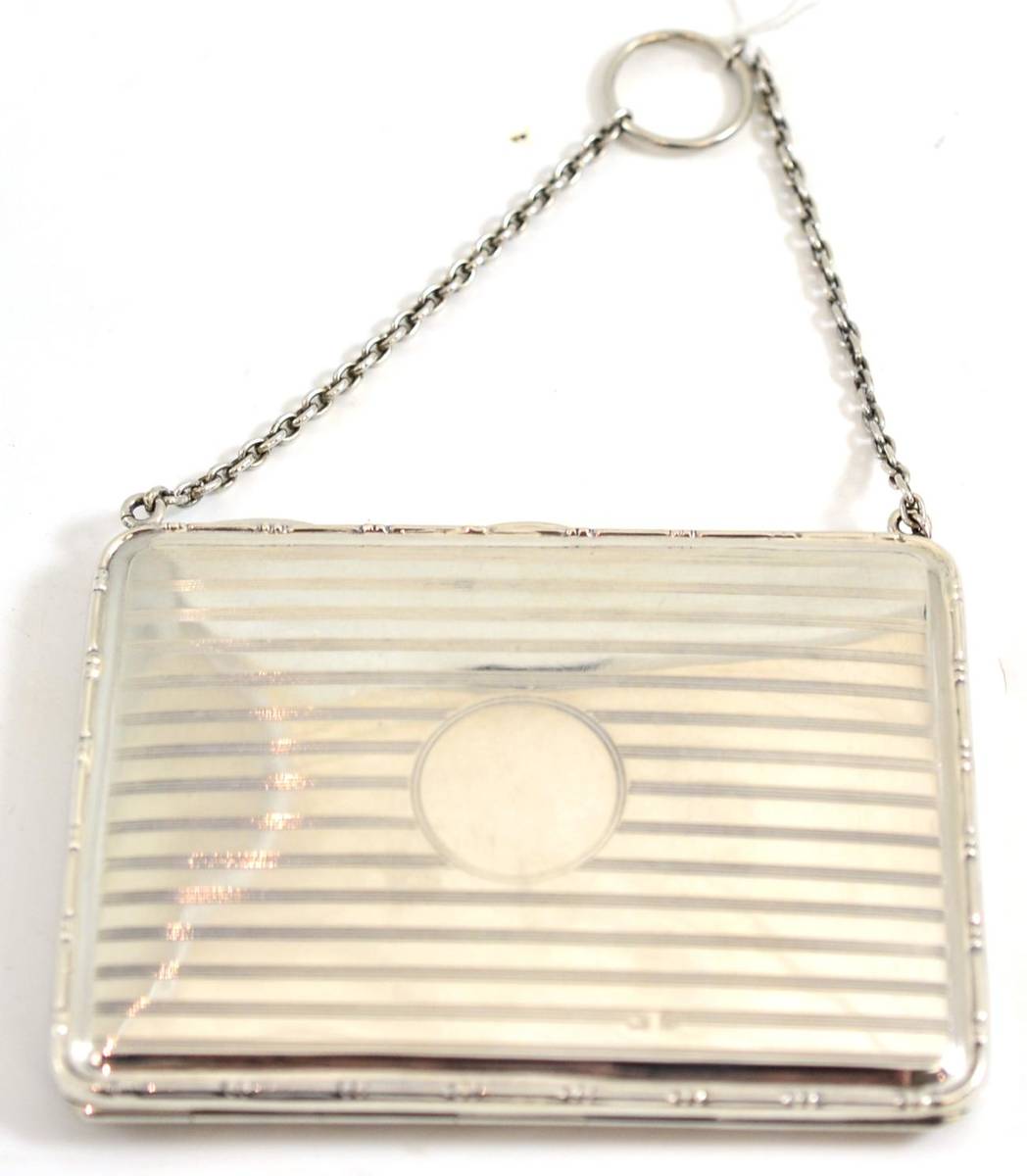 Lot 103 - A silver card case/purse, William Greenwood & Sons, Birmingham 1938, with suspension chain
