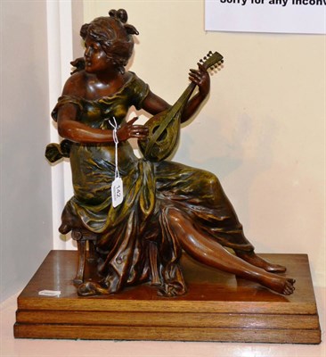 Lot 142 - Victorian spelter figure of a mandolin player