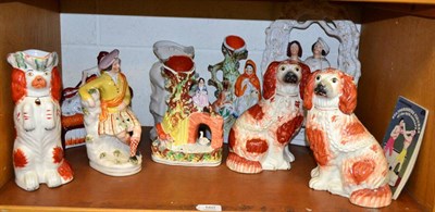 Lot 160 - A shelf of Staffordshire figures, pair of dogs and seven other figures