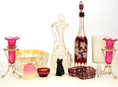 Lot 172 - Claret jug, amethyst glass press moulded figure of a seated dog and cranberry vases, etc