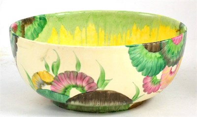 Lot 178 - A Bizarre Clarice Cliff bowl decorated with flowers in yellow and pink