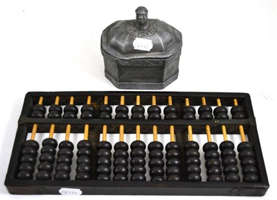 Lot 179 - An 18th century tobacco box with a negro knop and an abacus