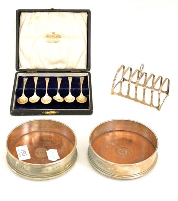Lot 190 - Pair of cased modern silver bottle coasters, silver toast rack, cased set of six silver...
