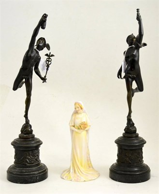 Lot 201 - Pair of bronzed figures and a Royal Doulton figure ";The Bride"; (3)