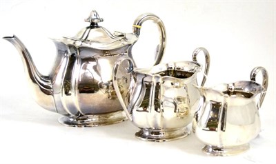 Lot 209 - A silver three piece tea service, 30oz