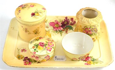 Lot 218 - Royal Worcester blush ivory including a jar and cover painted with flowers, a trinket jar and cover