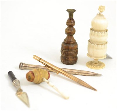 Lot 233 - A gavel shaped pin cushion, turned ivory sewing holder, wooden seal, a silver and 9ct gold...