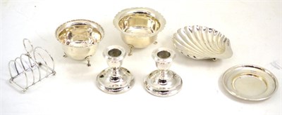 Lot 238 - Seven pieces of small silver including a pair of dwarf candlesticks