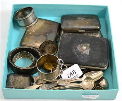 Lot 248 - Box of small silver including teaspoons, cigarette cases, napkin rings, hinged bangle etc