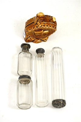 Lot 273 - Rare First World War pottery money box and four silver lidded glass toilet bottles