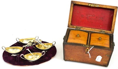 Lot 280 - Four oval salts with gilt interiors and spoons, caddy and key and two spoons