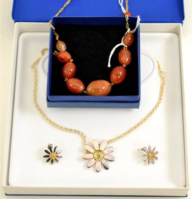 Lot 301 - A Cornelian necklace and a daisy motif necklace and matching earrings