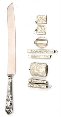 Lot 332 - A silver vesta case, two stamp cases, locket, cheroot holders and silver handled bread knife etc