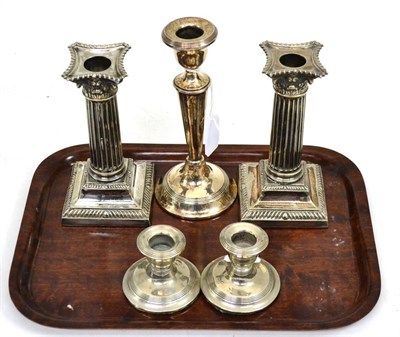 Lot 381 - A pair of silver plated candlesticks, pair of silver dwarf candlesticks and another silver...