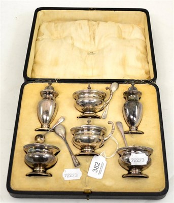 Lot 382 - A cased set of silver salts and peppers