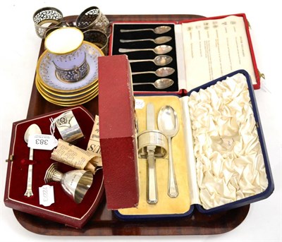 Lot 383 - A cased set of silver teaspoons, two cased silver Christening sets, four pierced silver cup holders