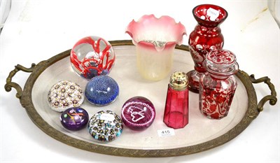 Lot 415 - A reproduction tray, six glass paperweights, a cranberry glass shade and other cranberry glass