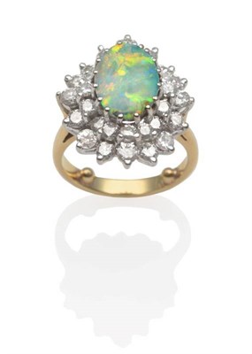 Lot 196 - An Opal and Diamond Cluster Ring, an oval boulder opal within an undulating two tier border of...
