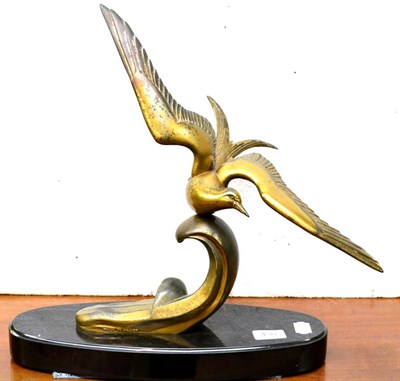 Lot 430 - After Irene Rochard (1906-1984) gilt metal model of a gull on a wave, on a black base inscribed...