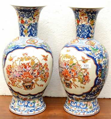 Lot 431 - A pair of Chinese porcelain vases with six character mark