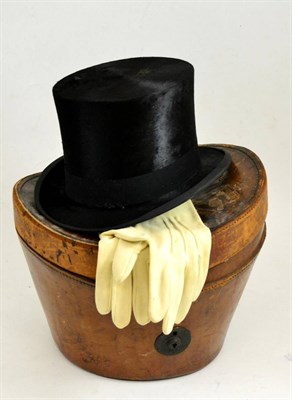 Lot 447 - A black silk top hat and gloves in leather case